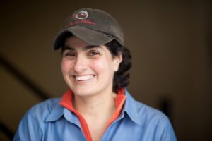 Nergis Mavalvala in a gray School of Science hat