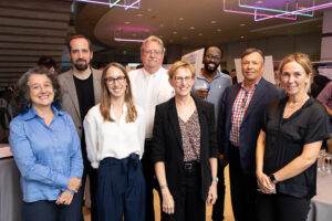 A group photo of eight researchers